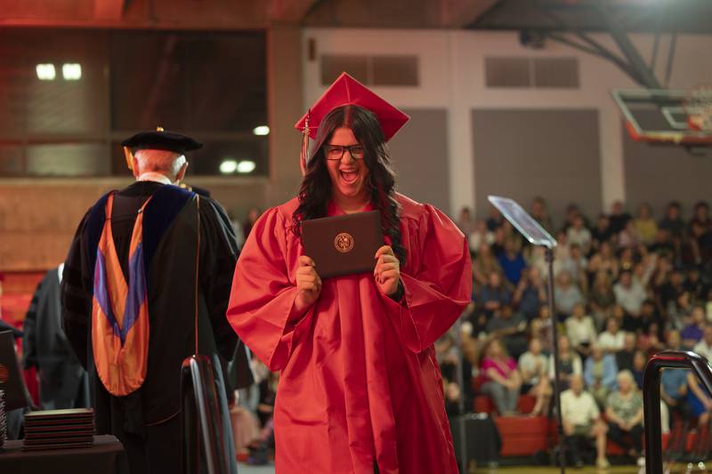 Graduate Leah Kalina celebrates her diploma Friday, May 15, 2026, during Sauk Valley Community College’s commencement ceremony.