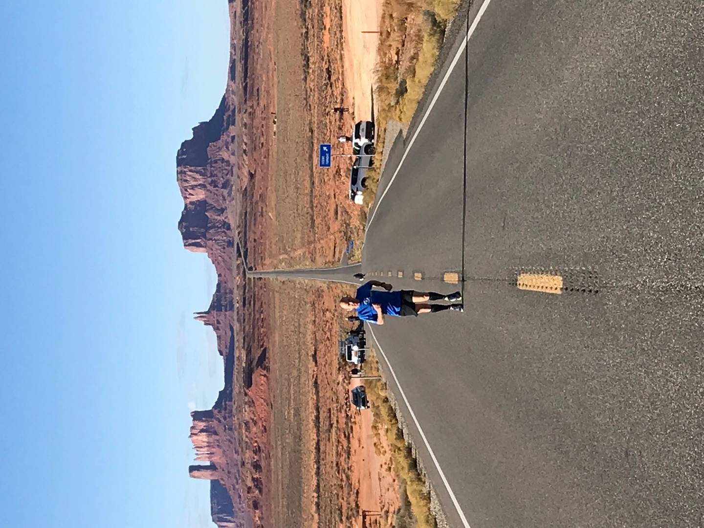 Larry Burton runs a stretch of road in Monument Valley in Utah.