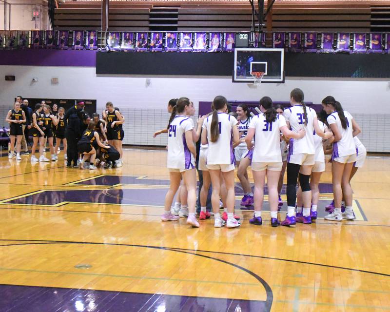 Downers Grove North celebrates their 4A regional championship victory over St. Laurence on Thursday Feb. 19, 2026, held at Downers Grove North High School.