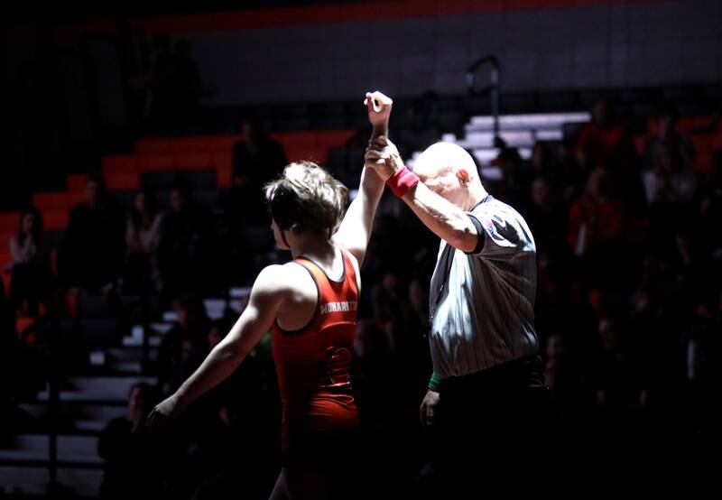 St. Charles East’s Dom Munaretto is declared the winner over Batavia’s Ino Garcia in the 120-pound weight class during a dual meet in St. Charles on Thursday, Jan. 4, 2024.
