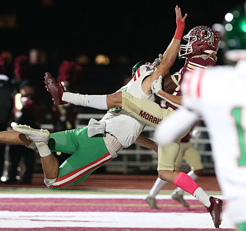 Morris's Willl Knapp misses this pass in the end zone during the final play of the first half as L-P's Brendan Boudreau (15) breaks up the pass during the Class 5A round one football game on Friday, Oct. 28, 2022 in Morris.