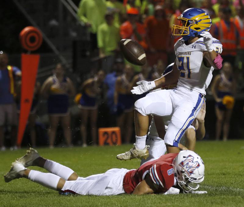 Marian Central's Jackson Jakubowicz hits the ground after blocking Johnsburg's Nicholas LoPresti’s extra point attempt during a non-conference football game Friday, Sept. 2, 2022, between Marian Central and Johnsburg at Marian Central High School.