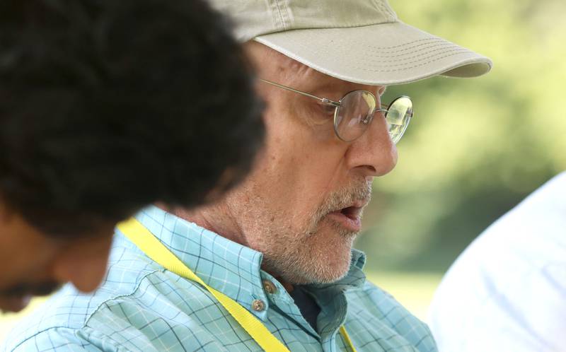 Paul Hough of Chicago participates in a session of shape note singing during the Fox Valley Folk Music & Storytelling Festival at Wheeler Park in Geneva on Sunday, August 31, 2025. Hough first discovered shape note singing as part of a Geneva festival several years ago. “I enjoy it because it’s all inclusive,” said Hough as he vocalized notes with a dozen others. “Shape note singing really is community singing unlike anything else.”