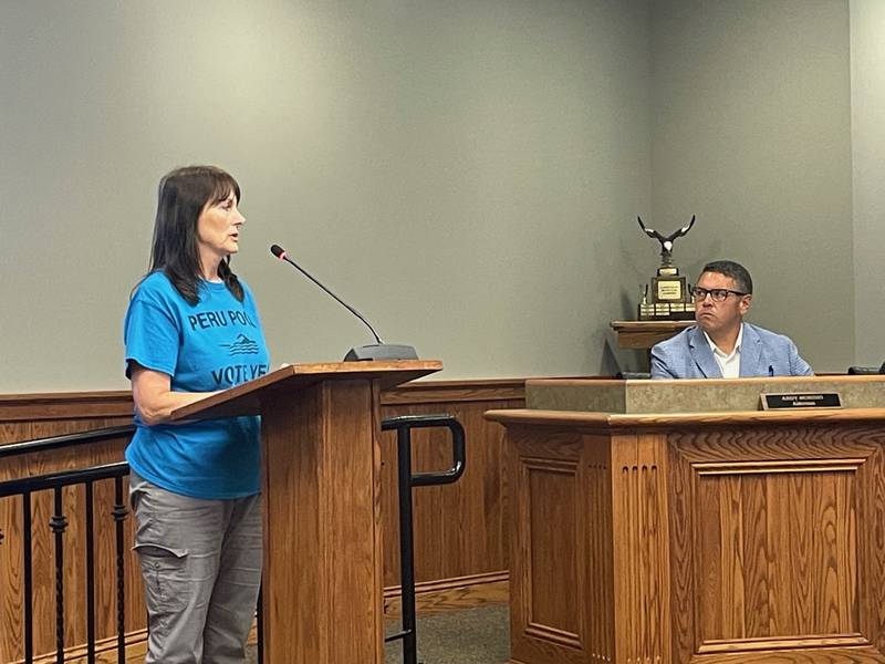 Sherry Mayszak, seen here addressing the Peru City Council on Thursday, Sept. 26, 2024, pushed for a referendum on building a municipal pool. Now, she's urging the council to abide by the results. “Let’s see what the people want," she said. "If they say yes, then we can hash out the details. If they say no, it’s a done deal.”