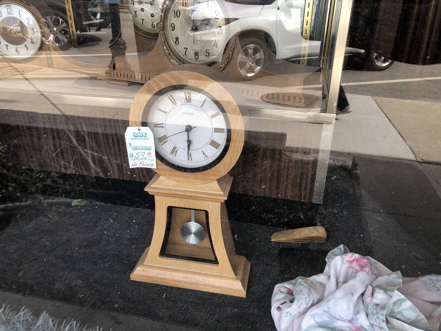 Customers notes in the window at McHenry Clock Co. on Monday, March 10, 2025. The store owner died on Jan. 3 and customers are asking how to get the timepieces left there for repairs returned.