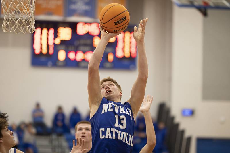 Newman’s George Jungerman puts up a shot against Eastland Tuesday, Dec. 10, 2024, at Eastland High School.