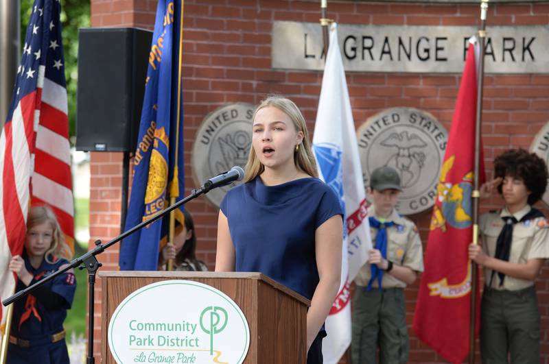 Sofia Mcgajne of La Grange Park performs the Star Spangled Banner during the Memorial Day ceremony held at Veterans Memorial Park Monday May 26, 2025.