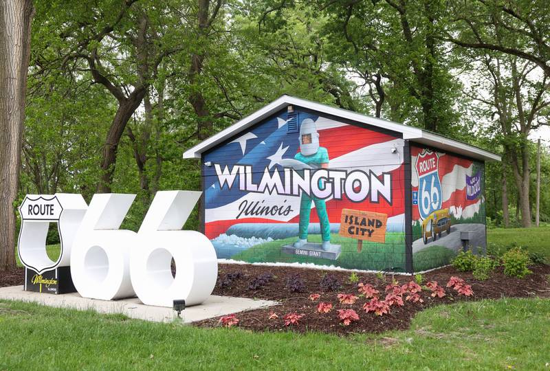 A three-sided mural greets visitors near the entrance to the new location of the Gemini Giant and The Landing Pad Souvenir Shop at Wilmington's South Island Park, painted by Lemont artist Robert Ryan after winning a design contest.