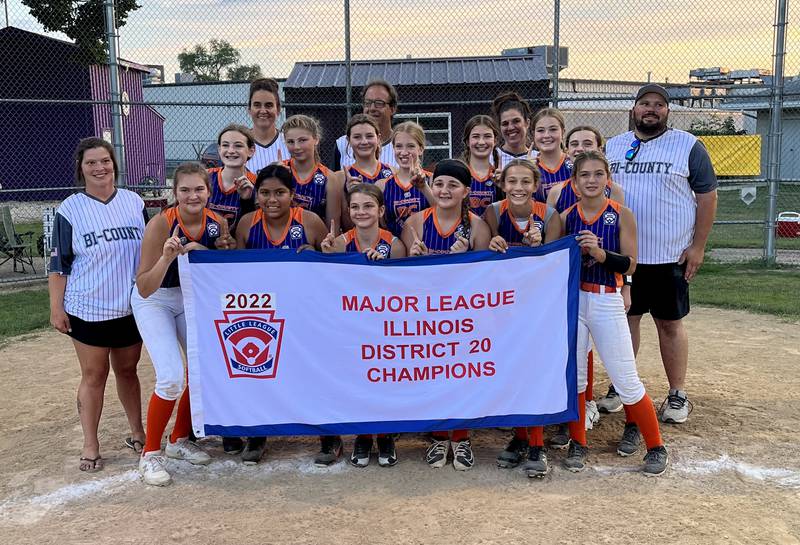 Members of the Bi-County Major League Softball team pose with their banner after beating Oglesby 9-4 on Thursday in the District 20 title game in Mendota.