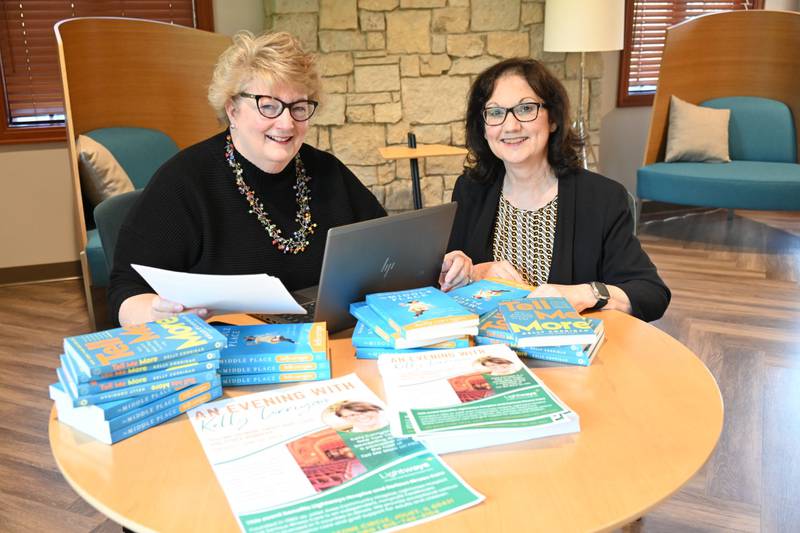 Lightways Hospice and Serious Illness Care’s Eileen Gutierrez (left) and Laureen Crotteau recently put together promotional kits for “An Evening with Kelly Corrigan,” to be held June 20 at the Rialto Square Theatre in Joliet. Corrigan, a New York Times bestselling author, will be in conversation with WGN radio host John Williams to discuss topics like death and dying, grief and hope.