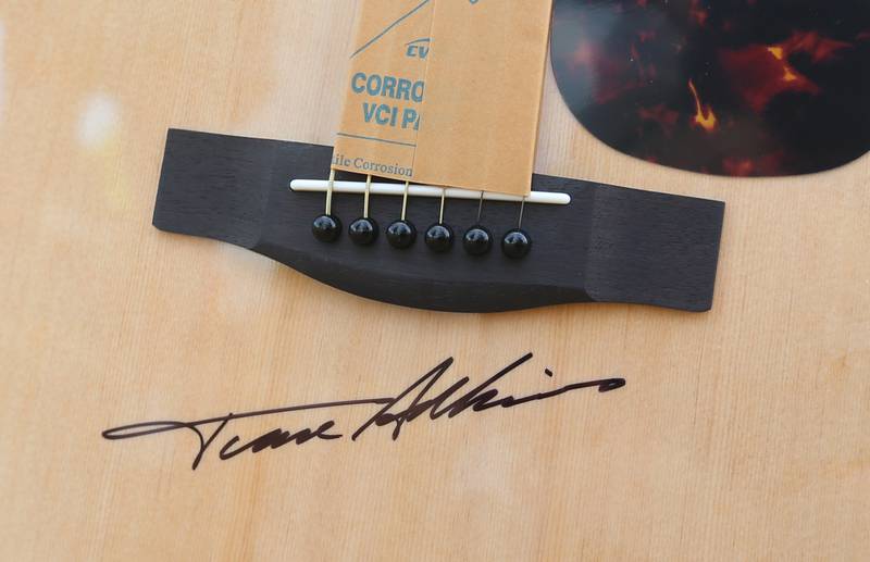 A close up of a Trace Adkins autographed guitar on Thursday, Aug. 21, 2025 at the Bureau County Fair in Princeton.