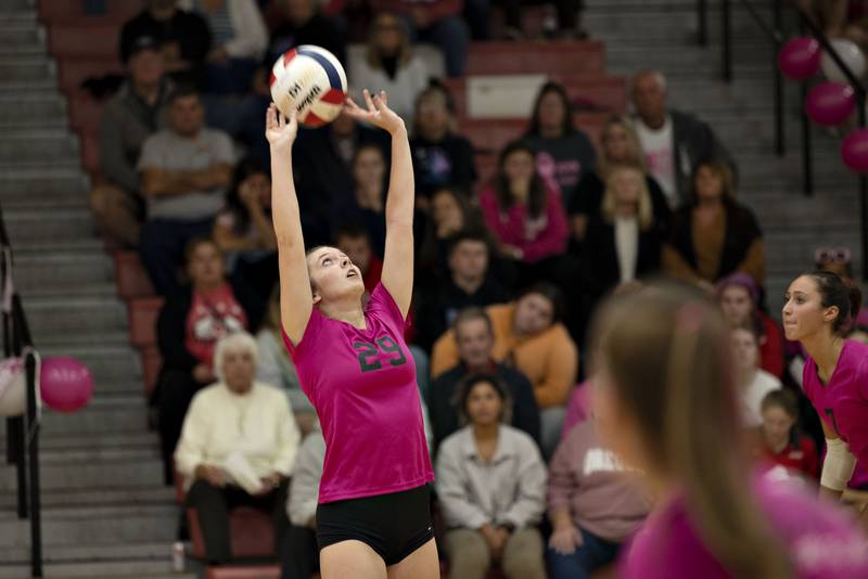 Oregon’s Lexi Ebert sets the ball Tuesday, Oct. 11, 2022 against Rock Falls.