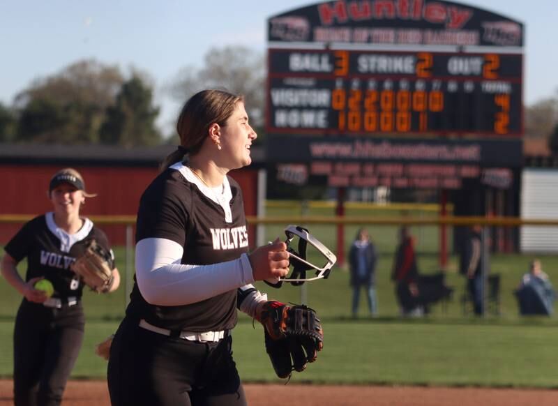 Prairie Ridge’s Reese Mosolino, front, and Ady Kiddy, left, leave the field after a 4-2 win in varsity softball at Huntley High School in Huntley on Monday, May 5, 2025.