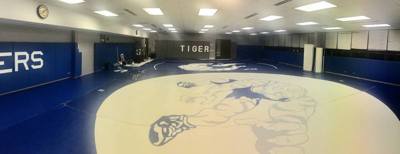 The Princeton Tiger wrestling team has a new room to call home at the entrance to Prouty Gym. Coach Steve Amy said it has immensely enhanced their practices with much more room than before.