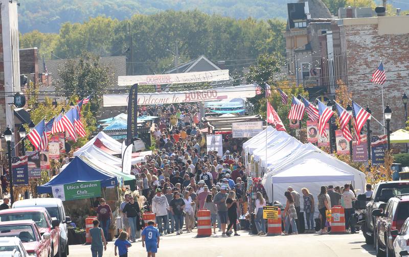 An elevated view of the crowd walking down Mill Street during the 55th annual Burgoo Festival on Sunday, Oct. 12, 2025 in Utica.
