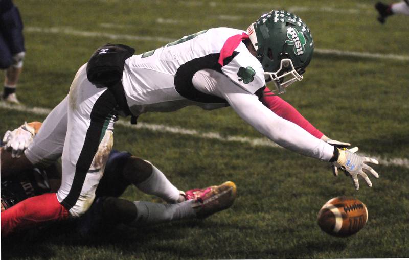 Seneca's Asher Hamby recovers a loose offensive ball at Gould Stadium on Friday, Oct. 6, 2023.