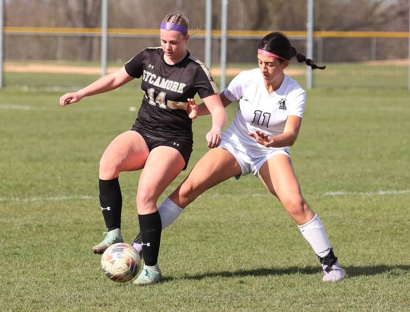 Sycamore's Peyton Wright and Kaneland's Corinne Faivre battle for possession during their game Monday, April 14, 2025, at Sycamore High School.
