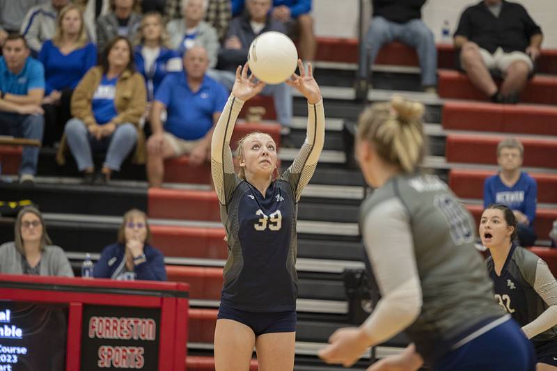 River Ridge’s Laiken Haas sets the ball Wednesday, Nov. 2, 2022 in the sectional championship game against Newman.