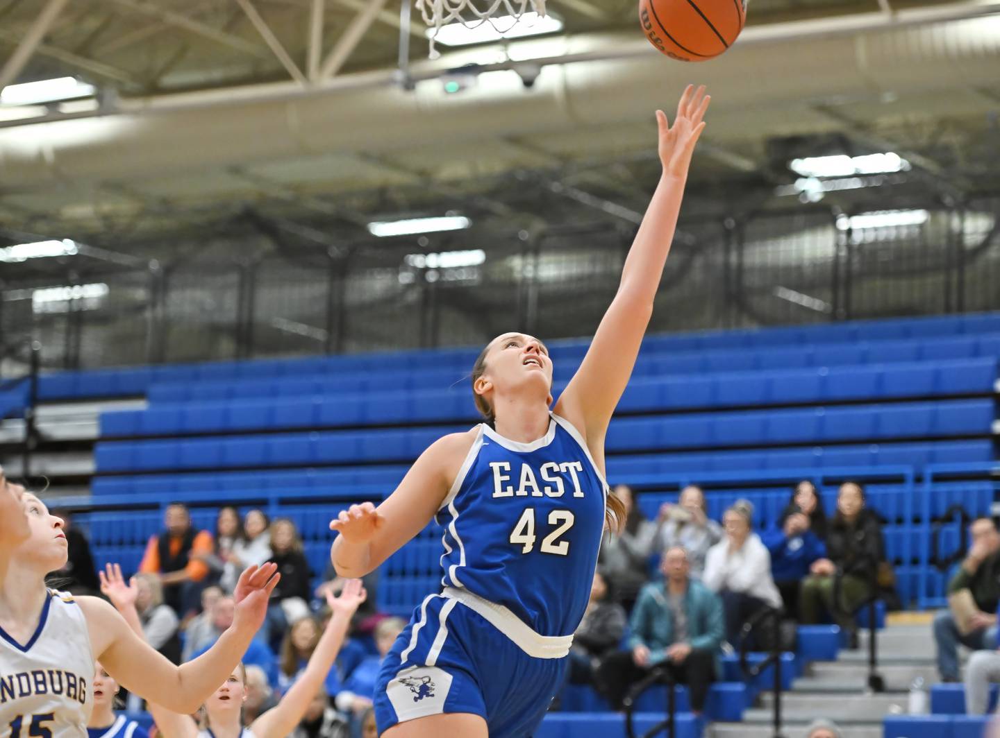 Lincoln-Way East's Hayven Smith (42) goes up for a layup   during the Carl Sandburg Holiday Tournament against Sandburg on Friday, Dec. 29, 2023, at Orland Park. (Dean Reid for Shaw Local News Network)