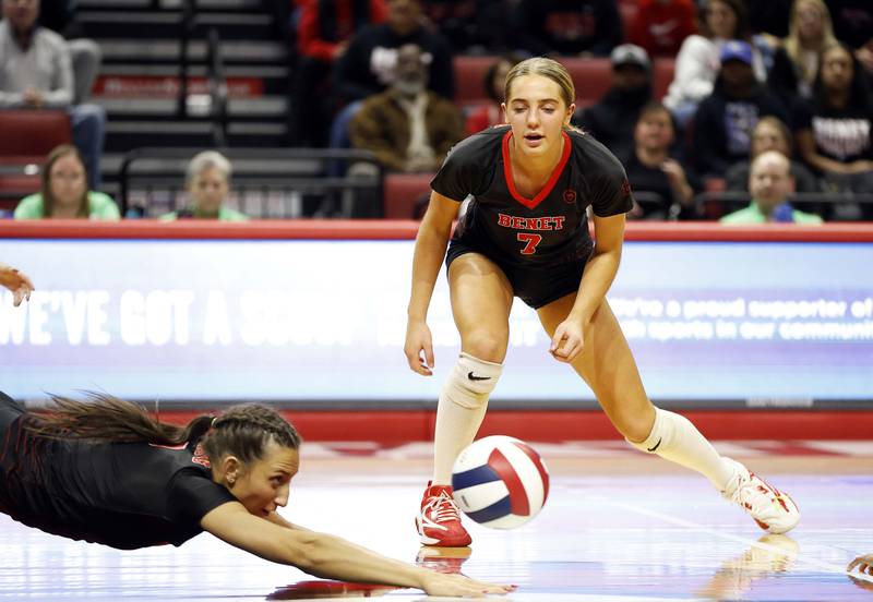 Benet Academy's Gabby Stasys (2) gets her hand under the ball as she dives for it during the IHSA Class 4A girls volleyball championship match Saturday, Nov. 16, 2024 at CEFCU Arena in Normal.