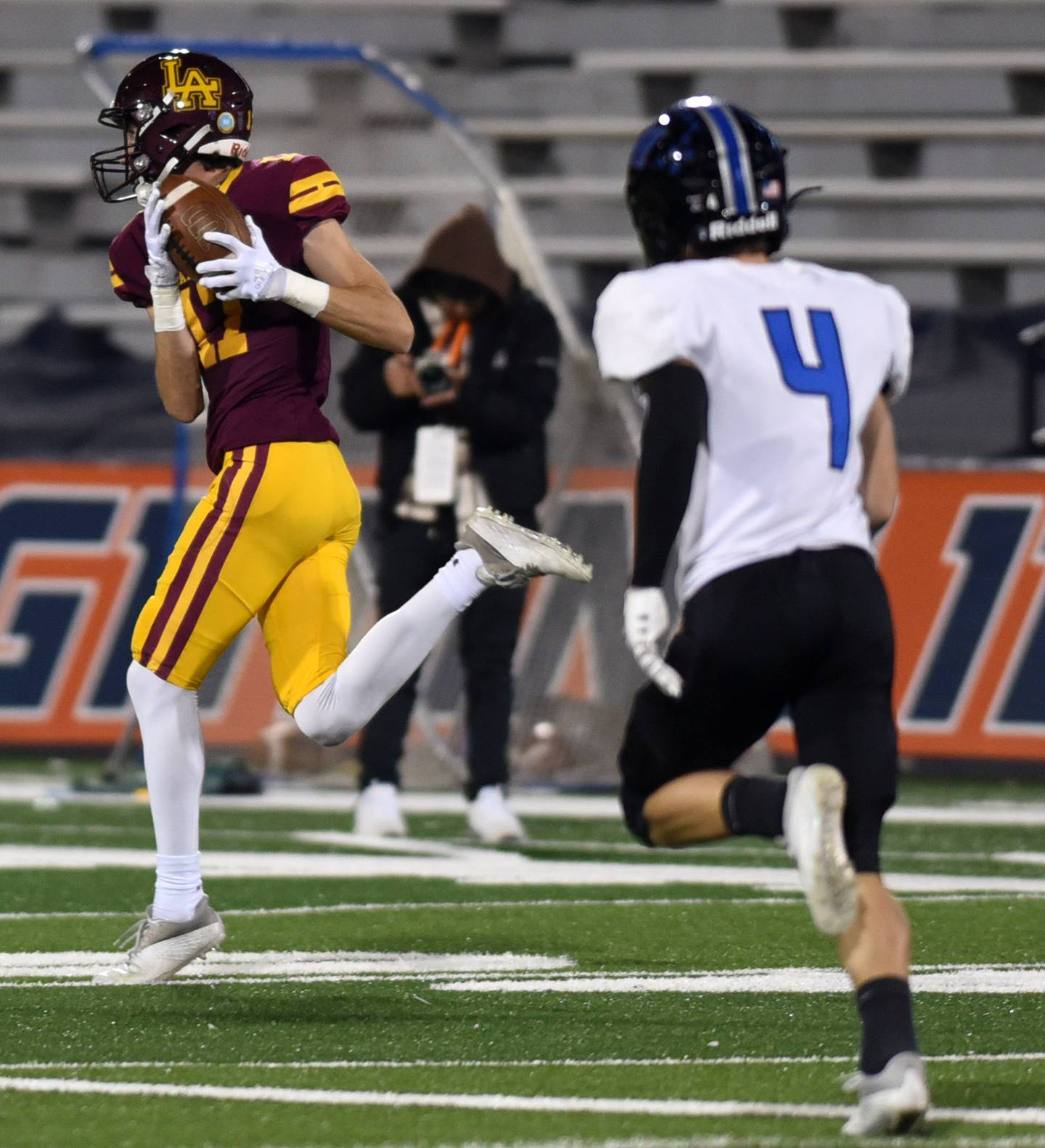 Loyola Academy's Declan Forde makes a touchdown catch against Lincoln-Way East during the Class 8A football state title game at Memorial Stadium in Champaign on Saturday, Nov. 26, 2022.