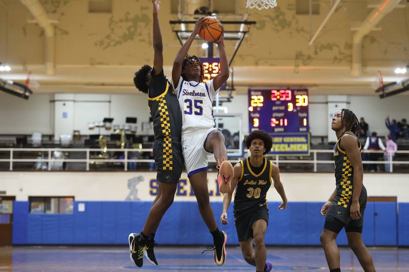Joliet Central’s Revell Gilbert goes up for the basket against Joliet West on Thursday, Jan. 15, 2026 in Joliet.