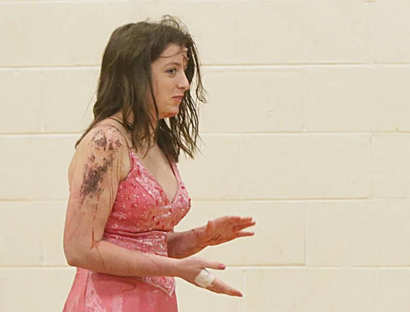 Brynn Pennington a student at Leland High School, speaks to classmates on her experience after participating in a Mock Prom drill at Leland High School on Friday, May 6, 2022 in Leland.