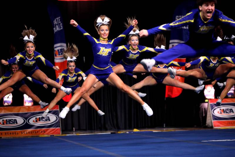 Members of the Lyons Township cheerleading team compete in the coed team division of the IHSA State Finals on Saturday, Feb. 8, 2025 at Grossinger Motors Arena in Bloomington.