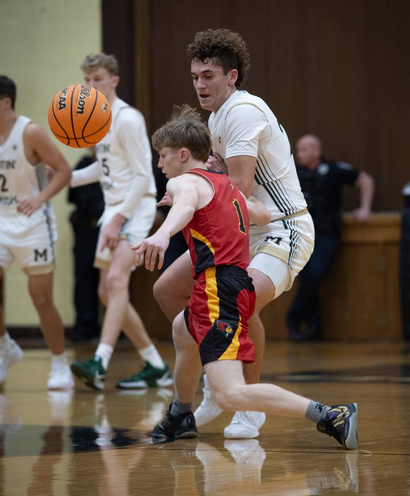 St. Anne's Raleigh Hays looses the ball as Bishop McNamara's Karter Krutsinger guards in a game on Wednesday, November 26, 2025.