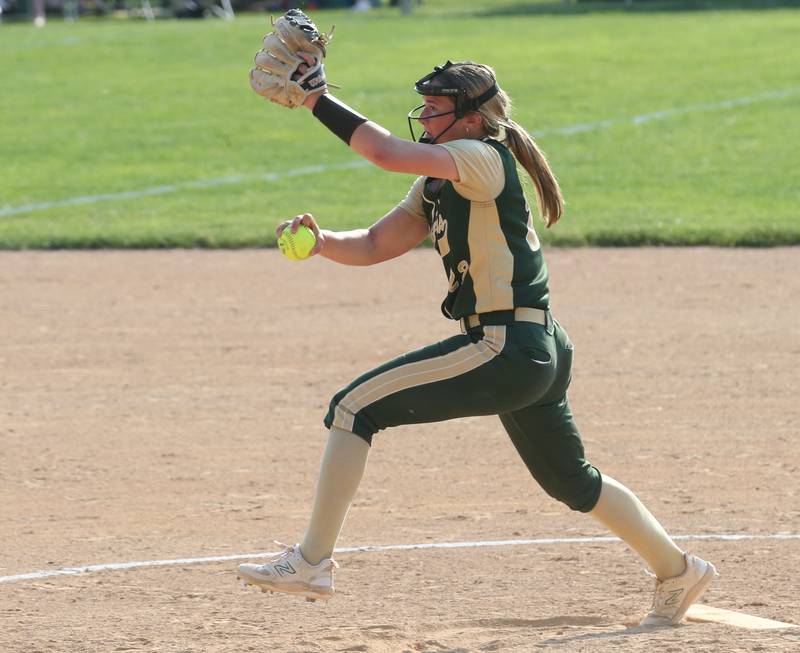 St. Bede pitcher Ella Hermes lets go of the ball while facing Ridgewood AlWood/Cambridge in the Class 1A Sectional semifinal game on Tuesday, May 23, 2023 at St. Bede Academy.