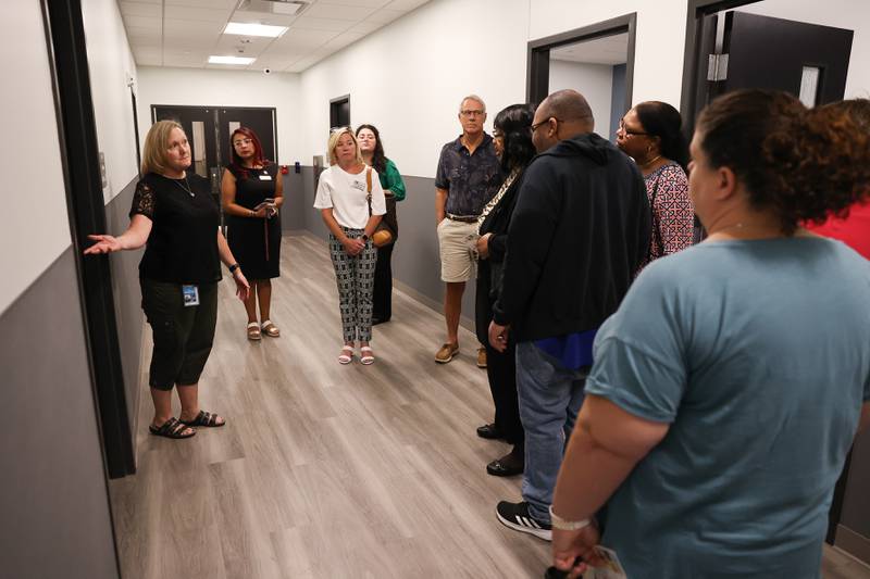 Kristin Schram, Director of Clinical Services gives a tour of the new Cornerstone Wellness Center on Tuesday, Aug. 8, 2023 in Joliet.