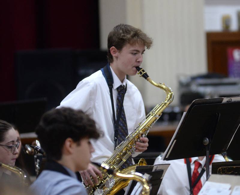 Gavin Warner plays the tenor saxophone during Oregon High School's Christmas Concert on Sunday, Dec. 17, 2023. The afternoon event was held in the OHS Music Room and also included performances by the OHS Choir.