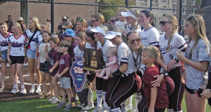 Team and supporters pose after the game. Dakota and Henry-Senachwine softball met in  Illinois  Class 1A Super Sectional in Sterling on June 2, 2025. Dakota won the contest 2-0.