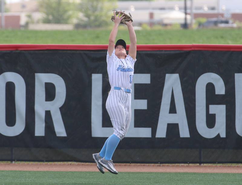 Oak Park River Forest's Maura Carmody squeezes her glove to make a jumping catch in center against Lockport during the Class 4A third-place game on Saturday, June 14, 2025 at the Louisville Slugger Sports Complex in Peoria.