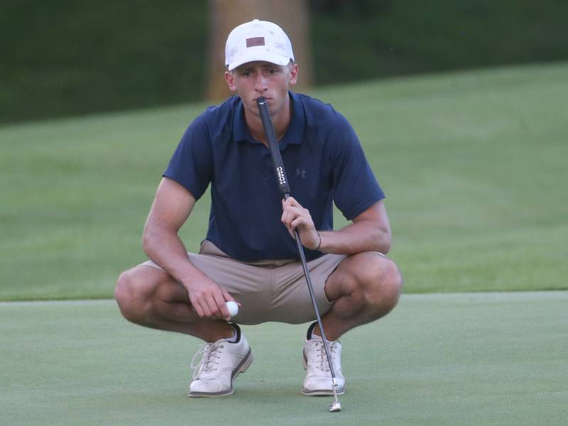Carter Frenza lines up a put during the Illinois Valley Mens Golf Championship Tournament on Sunday, July 27, 2025 at Spring Creek Golf Course in Spring Valley.
