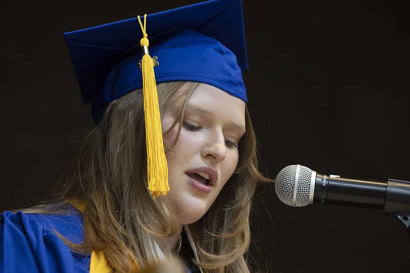 Salutatorian Sarah Murray reads the “Respect Life Prayer” Wednesday, May 17, 2023 during Newman High School’s commencement.