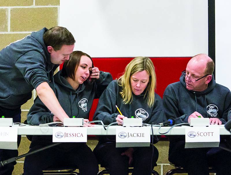 The Harrison Family figures out the answer to a question during the Stupor Bowl championship match Saturday afternoon at Reagan Middle School in Dixon. The Harrison's took runner-up honors.
