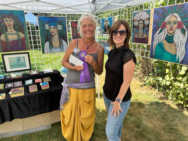 Linda Magklaris is pictured with Judge Jessica Modica at the Grand Detour Arts Festival