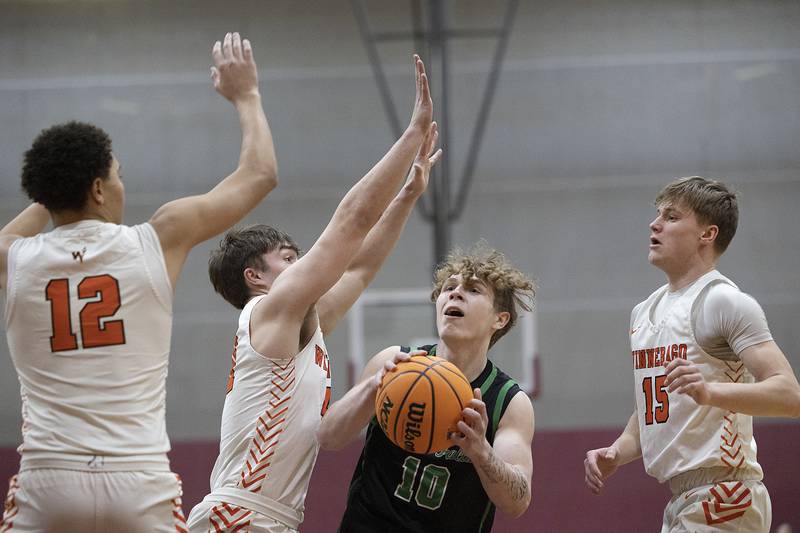 Rock Falls’ Kuitim Heald looks to put up a shot against Winnebago Tuesday, March 4, 2025, during the 2A boys basketball Sectional final at Marengo.