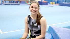 Kaneland gymnast returns to competition after enduring multiple concussions, a heart condition and severe knee injury