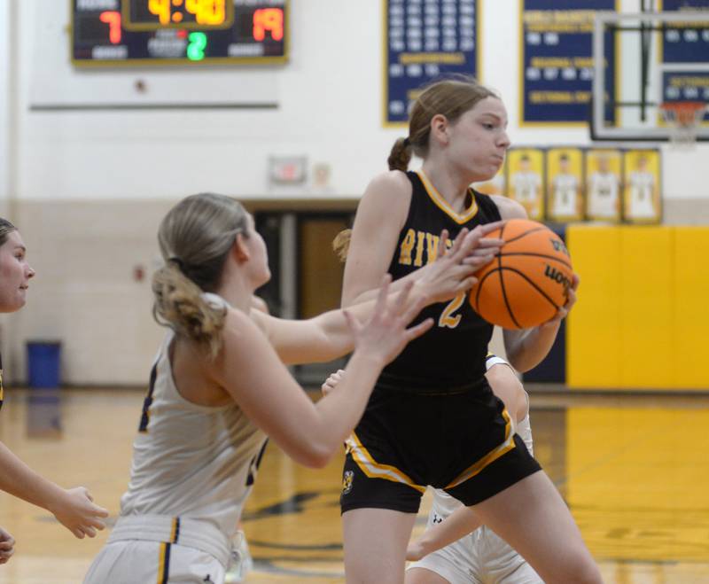 Riverdale's Isla Baldwin (2) snags a rebound against Polo on Saturday, Jan. 18, 2025 at Polo High School.