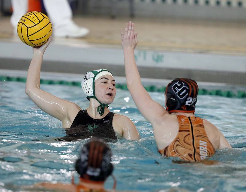 YorkÕs Gwen Peterson (5) shoots over Hersey's Avery Born (20) during the IHSA State Water Polo consolation match Saturday May 20, 2023 at Stevenson High School in Lincolnshire.