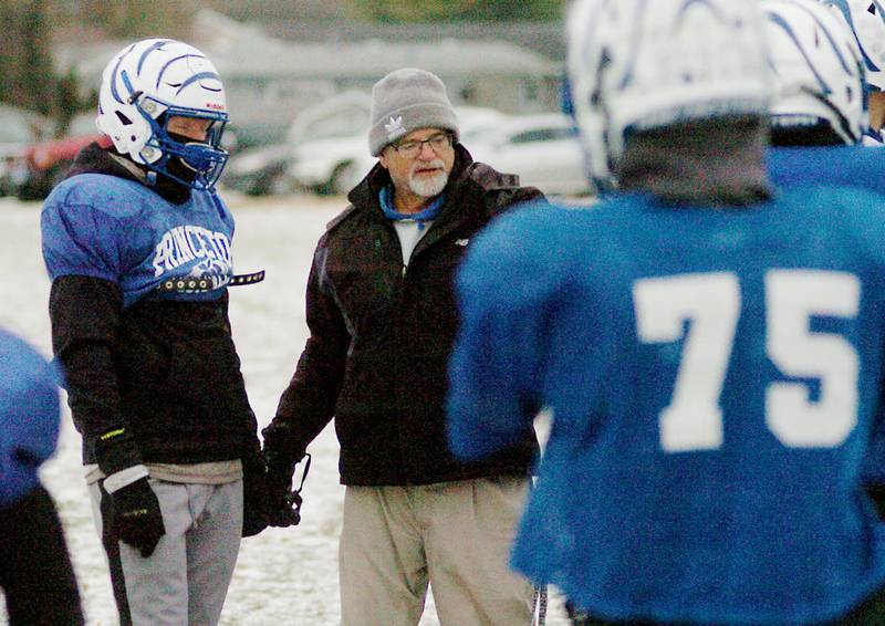 Dave Moore, formerly head football coach at Princeton and Bureau Valley, and head track coach with the Storm, has taken over as the new head track coach for the Tigers.