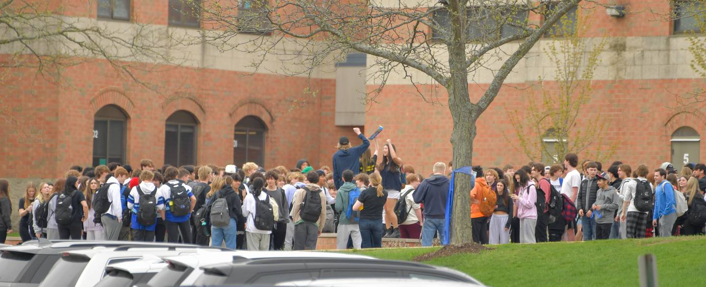 St Charles North students hold a walk-out on on Friday, April 21, 2023 in support of their teachers who are being involuntarily transferred at the end of the year.