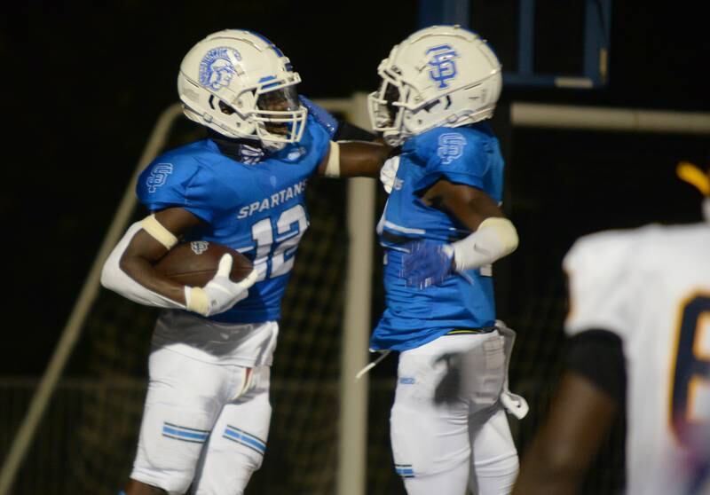 St. Francis's Amari Head and Ian Willis celebrate a goal  during their home game against Sterling Friday Sept 2, 2022.