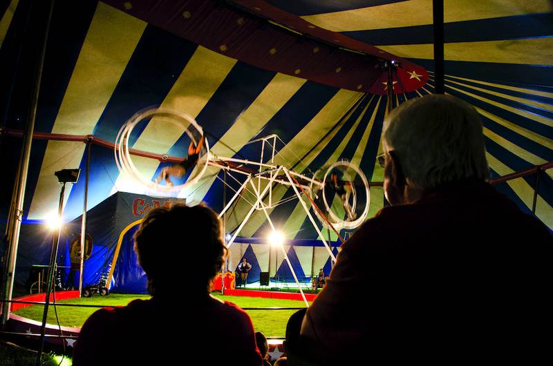 Crowds in Ashton sit and watch the thrills of the Wheel of Destiny on Tuesday evening during the stopover by the Culpepper & Merriweather Circus in Ashton.