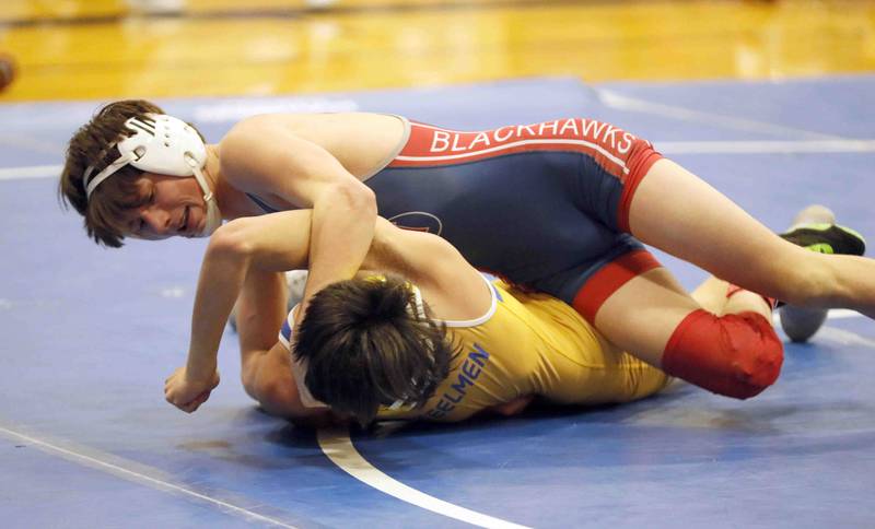 Aiden Massaro of West Aurora wrestles Brian Mendez of Joliet Central at 126 pounds during the Jim Newbill Wrestling Tournament Saturday January 7, 2023 at Geneva High School.