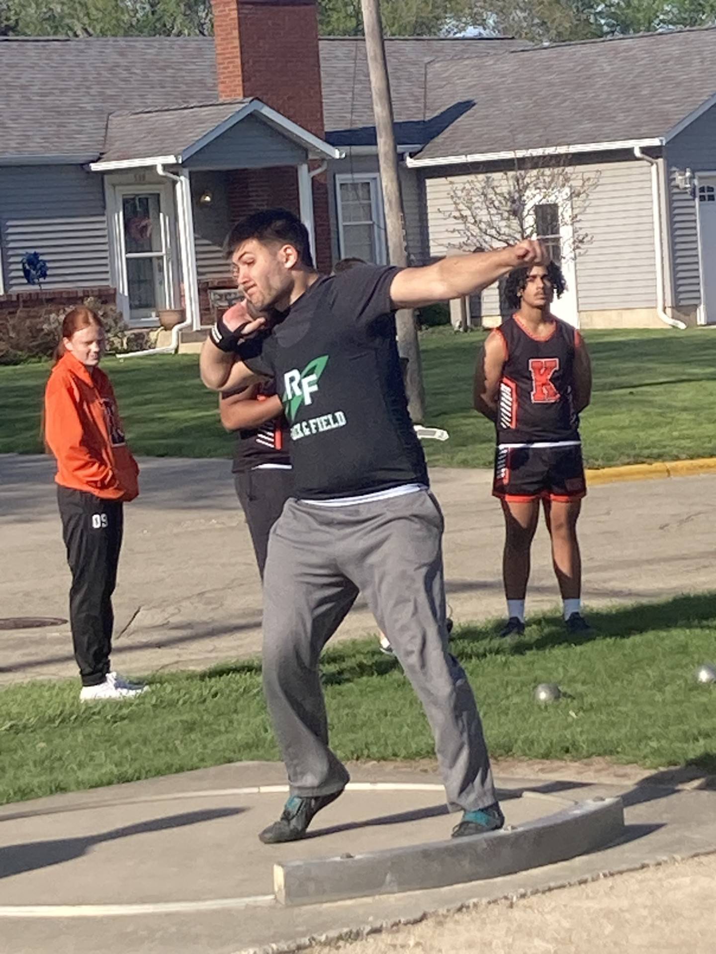 Rock Falls' Zach Walker throws the shot put in Monday's Ferris Family Invite at Princeton. He placed third.