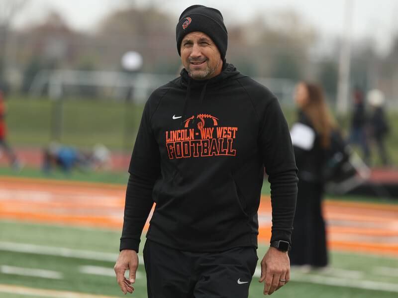 Lincoln-Way West head coachLuke Lokanc walks to the sidelines before the game against Batavia on Saturday, Nov. 9, 2024 in New Lenox.
