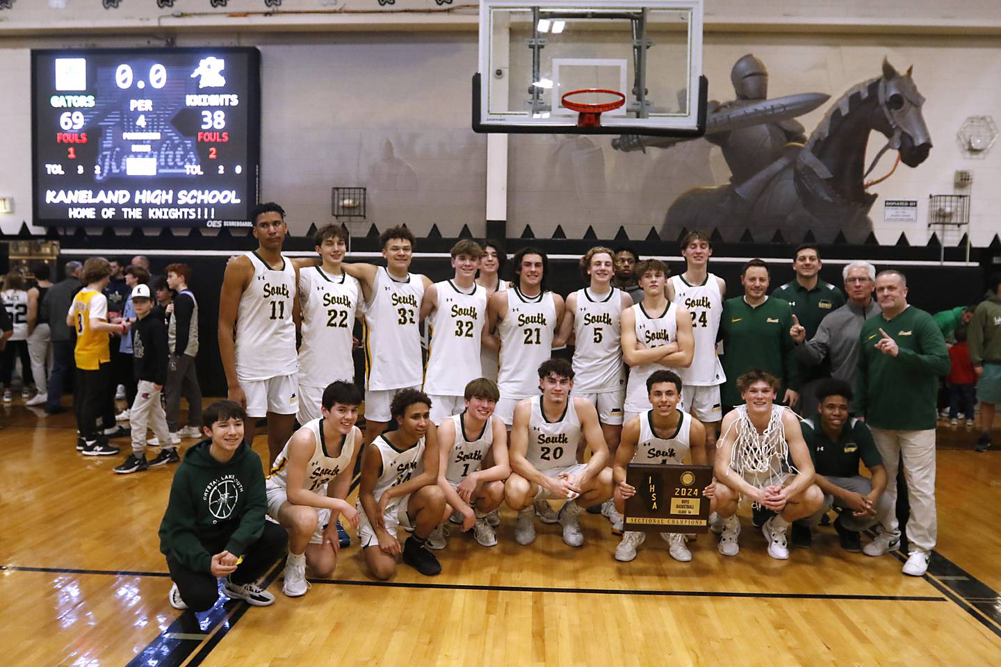 Crystal Lake South poses for a championship picture after they defeated Kaneland in the IHSA Class 3A Kaneland Boys Basketball Sectional championship game on Friday, March 1, 2024, at Kaneland High School in Maple Park.